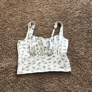 White with blue flowers, S Hollister tank, lightly worn, good condition